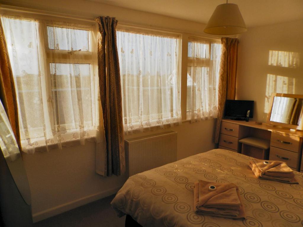 Wayside Cheer Hotel Castel Phòng bức ảnh